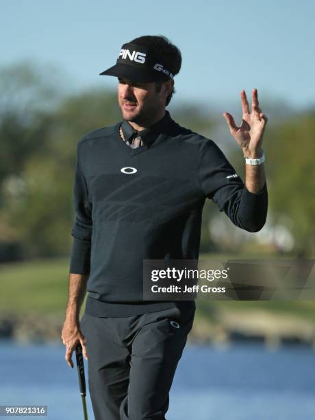 Bubba Watson reacts to his putt on the 18th hole during the third round of the CareerBuilder Challenge at the TPC Stadium Course at PGA West on...