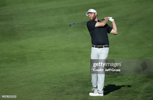 Chris Kirk plays his shot on the ninth hole during the third round of the CareerBuilder Challenge at the TPC Stadium Course at PGA West on January...