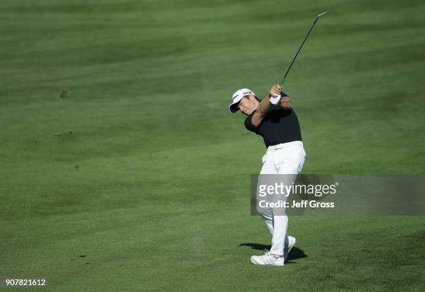 Camilo Villegas of Colombia plays his shot on the ninth hole during the third round of the CareerBuilder Challenge at the TPC Stadium Course at PGA...