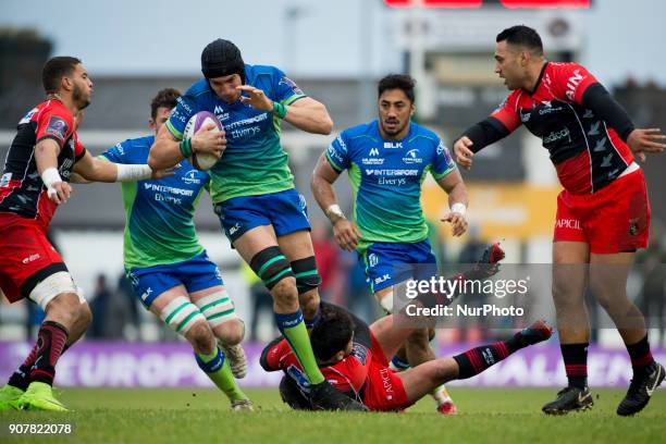 Ultan Dillane of Connacht tackled by Anthony Fuertes of Oyonnax during the European Rugby Challenge Cup Round 6 between Connacht Rugby and Oyonnax at...