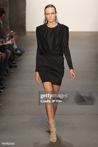 Model walks the runway wearing Thakoon Spring 2010 during Mercedes-Benz Fashion Week at Eyebeam on September 14, 2009 in New York City.
