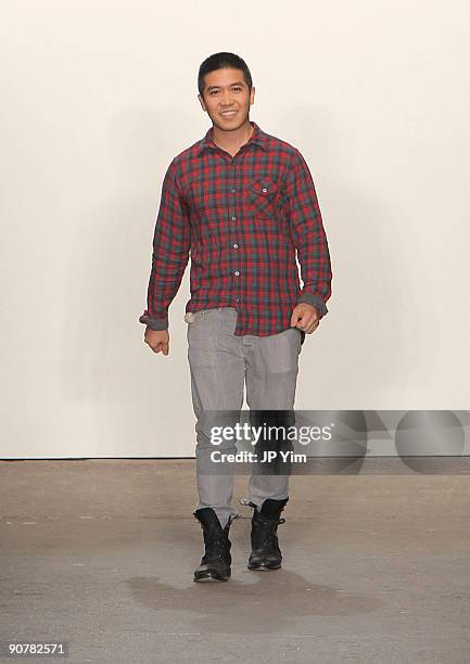 Designer Thakoon Panichgul acknowledges the audience after his Spring 2010 show during Mercedes-Benz Fashion Week at Eyebeam on September 14, 2009 in...