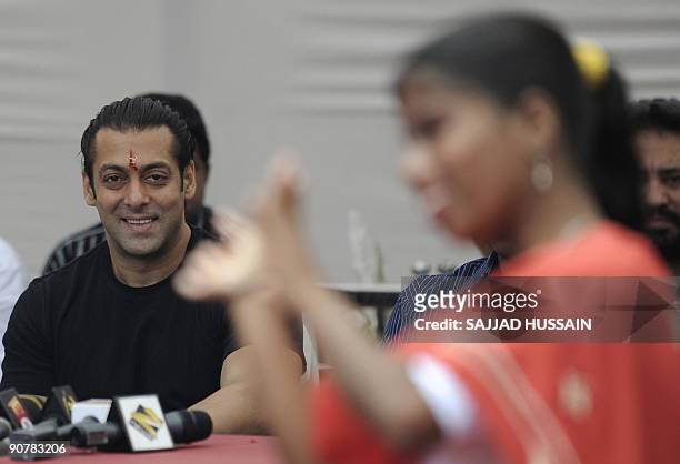 Entertainment-India-Bollywood-people-Khan,FOCUS by Shail Kumar Singh Indian cinema actor Salman Khan watches a dance display at a childrens remand...