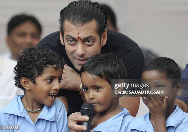 Entertainment-India-Bollywood-people-Khan,FOCUS by Shail Kumar Singh Indian cinema actor Salman Khan poses with children at a remand home for the...