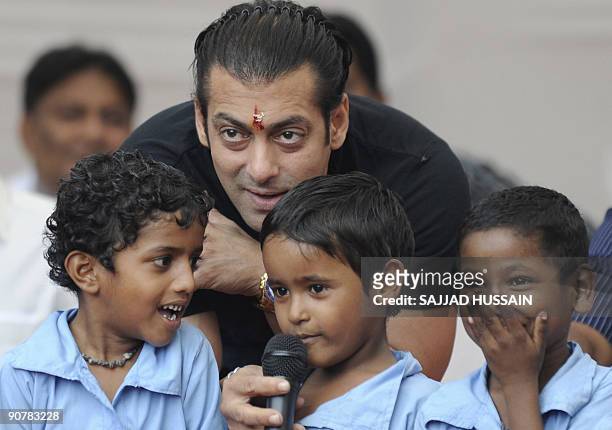 Entertainment-India-Bollywood-people-Khan,FOCUS by Shail Kumar Singh Indian cinema actor Salman Khan poses with children at a remand home for the...