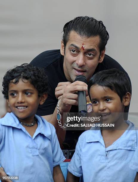 Entertainment-India-Bollywood-people-Khan,FOCUS by Shail Kumar Singh Indian cinema actor Salman Khan poses with children at a remand home for the...