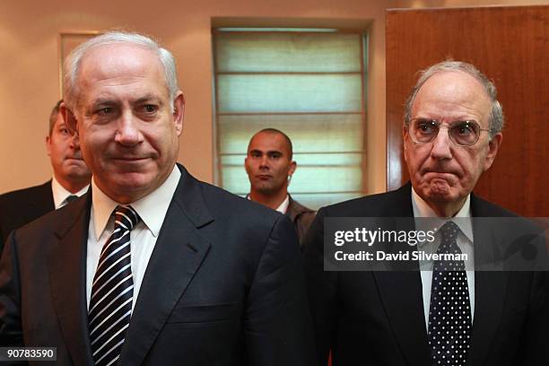 Special Envoy George Mitchell follows Israeli Prime Minister Benjamin Netanyahu into his office for their meeting September 15, 2009 in Jerusalem....