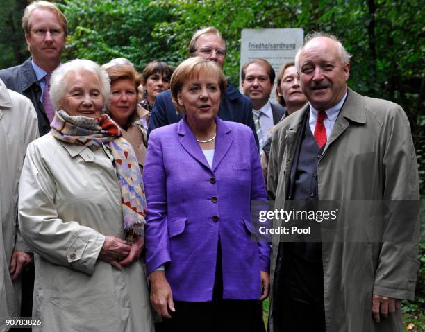 Angela Merkel, German Chancellor and leader of the conservative Christian Democratic Union party CDU is flanked by Konrad Adenauer , grandson of...