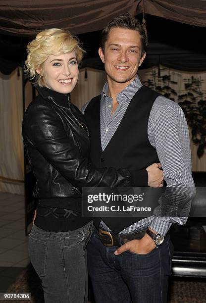 Actress Charlotte Sullivan and Director Peter Stebbings pose at the "Creative Coalition and MakingOf.com" dinner party during the 2009 Toronto...