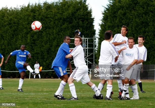 Chelsea's Jimmy Floyd Hasselbaink takes a freekick during a Chelsea Old Boys match at the club's Cobham training ground on September 14, 2009 in...