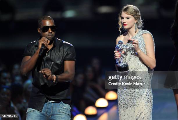 Kanye West takes the microphone from Taylor Swift and speaks onstage during the 2009 MTV Video Music Awards at Radio City Music Hall on September 13,...