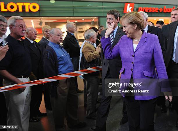 German Chancellor Angela Merkel of the Christian Democratic Union arrives on her first stop in Koblenz during her campaign rally in the historic...
