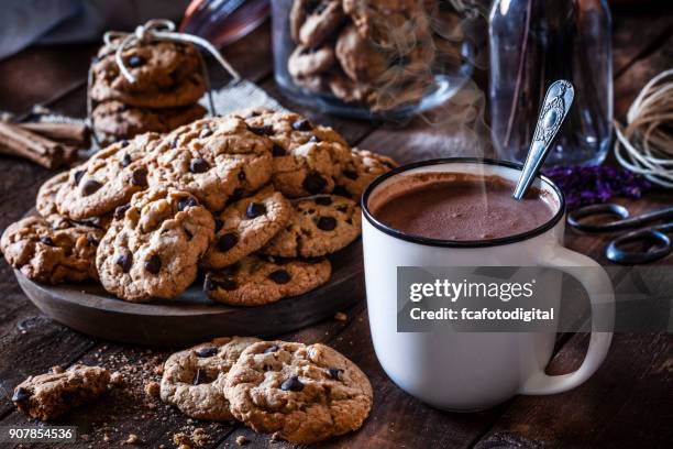 homemade chocolate chip cookies and hot chocolate mug - hot chocolate stock pictures, royalty-free photos & images