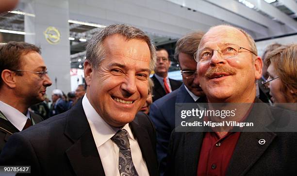 Magna 's Co-CEO Siegfried Wolf talks to the leader of the Opel works council Klaus Franz during the international motor show IAA on September 15,...