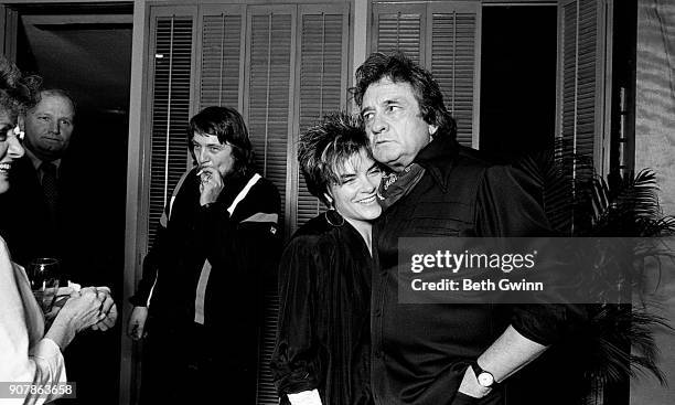 September 6: Country singer and songwriter Rosanne Cash and Johnny Cash celebrate Rosanne Cash's first song at BMI on September 6, 1985 in Nashville,...