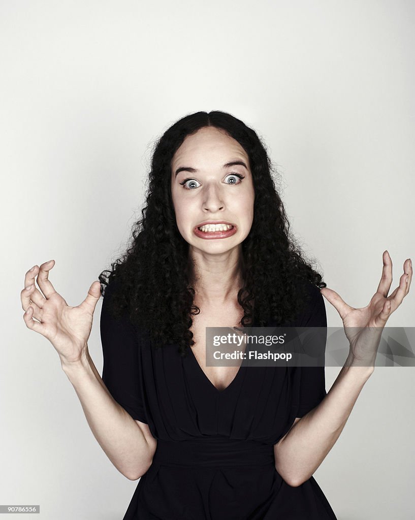 Portrait of woman looking frustrated