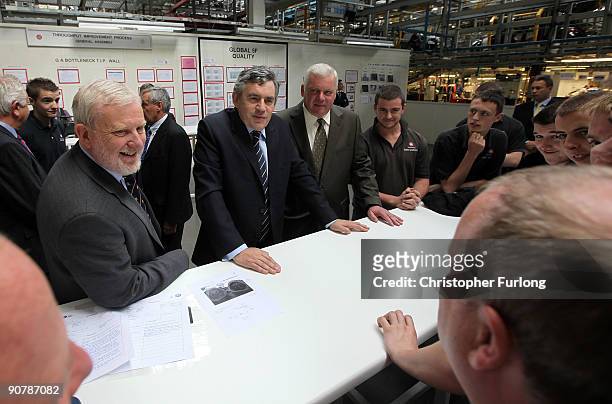 British Prime Minister Gordon Brown chats to apprentices as he tours the production line of the new Vauxhall Astra, which coincides with the launch...