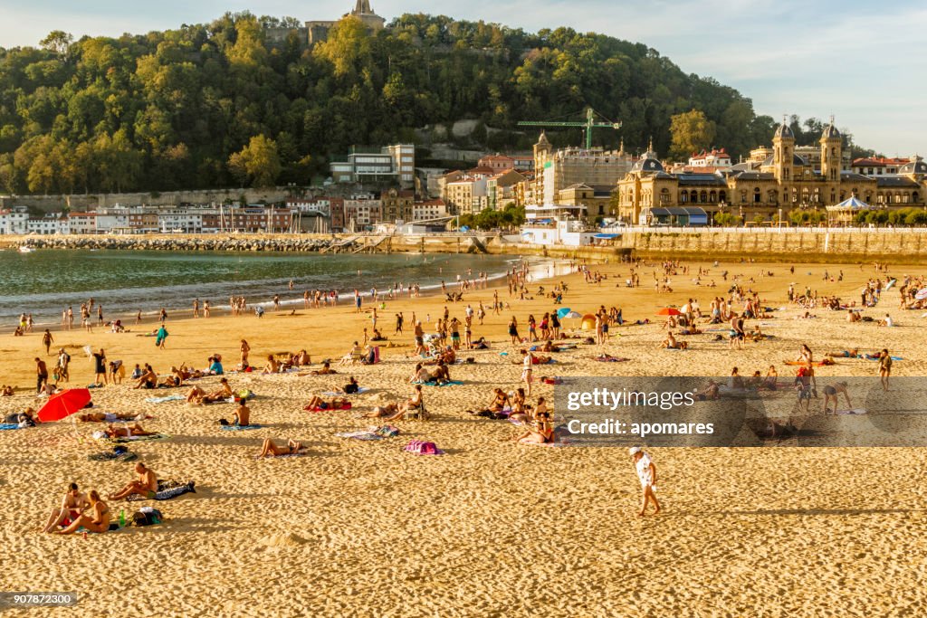 Crowded Summer Beach at sunset