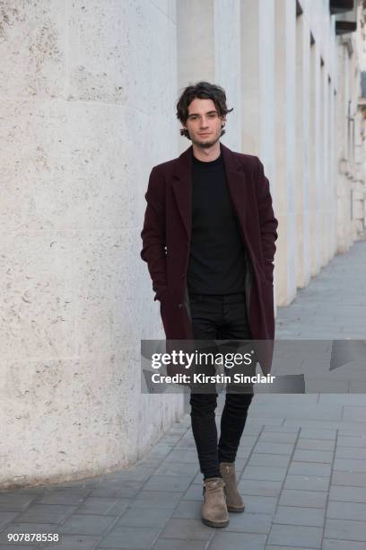 Actor Jack Brett Anderson wears Giuseppe Zanotti boots, River Island jacket, jeans and sweater day 2 of London Mens Fashion Week Autumn/Winter 2018,...
