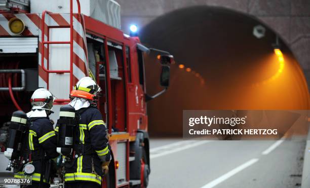 French firemen take part in a security exercise involving a car and a truck transporting 19 tons of wood and causing a high potential fire on the...