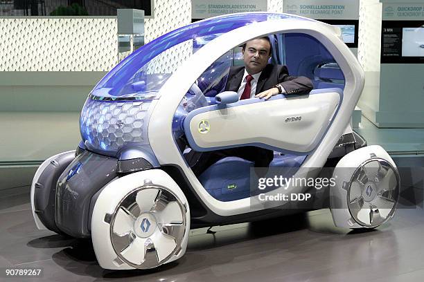 Of French car maker Renault Carlos Ghosn presents the new Renault electric car Twizy Z.E. During the 63rd International Motor Show in the central...