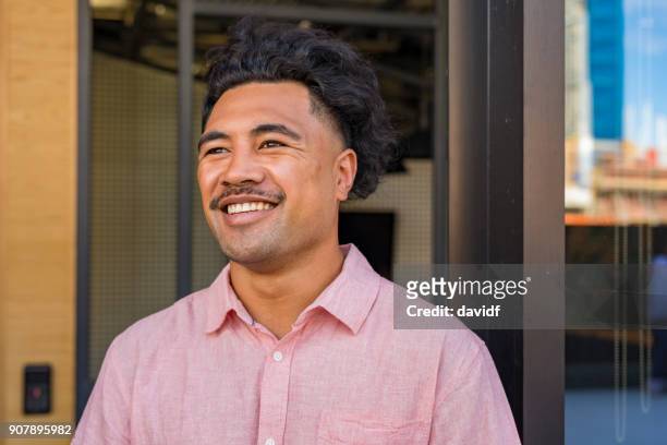 portrait of a new zealand maori man - maori stock pictures, royalty-free photos & images