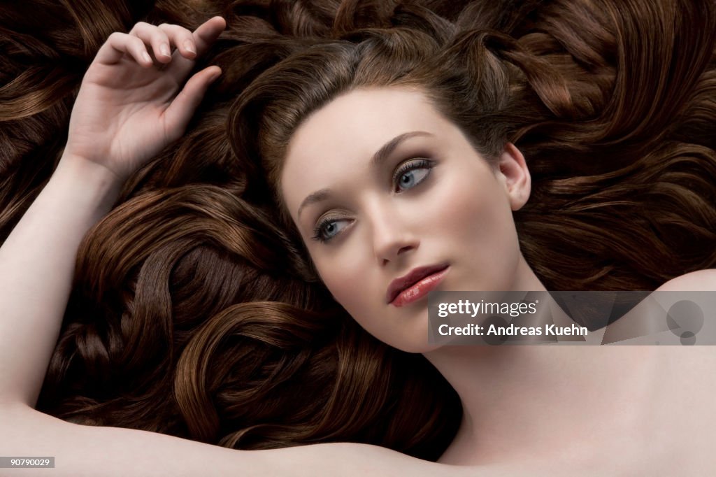 Young woman laying down, close up.