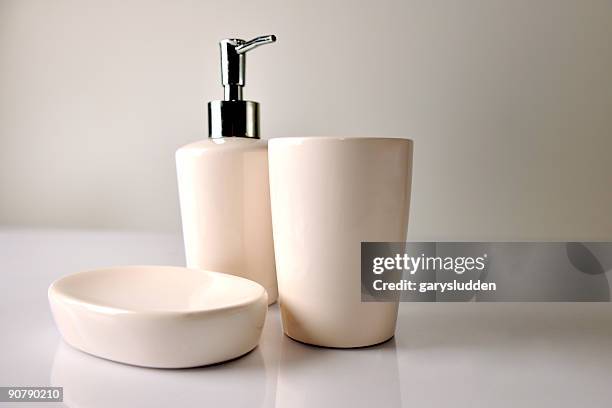 clean bathroom items against neutral background - saboneteira imagens e fotografias de stock