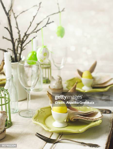 easter table setting. easter dinner - easter table stock pictures, royalty-free photos & images