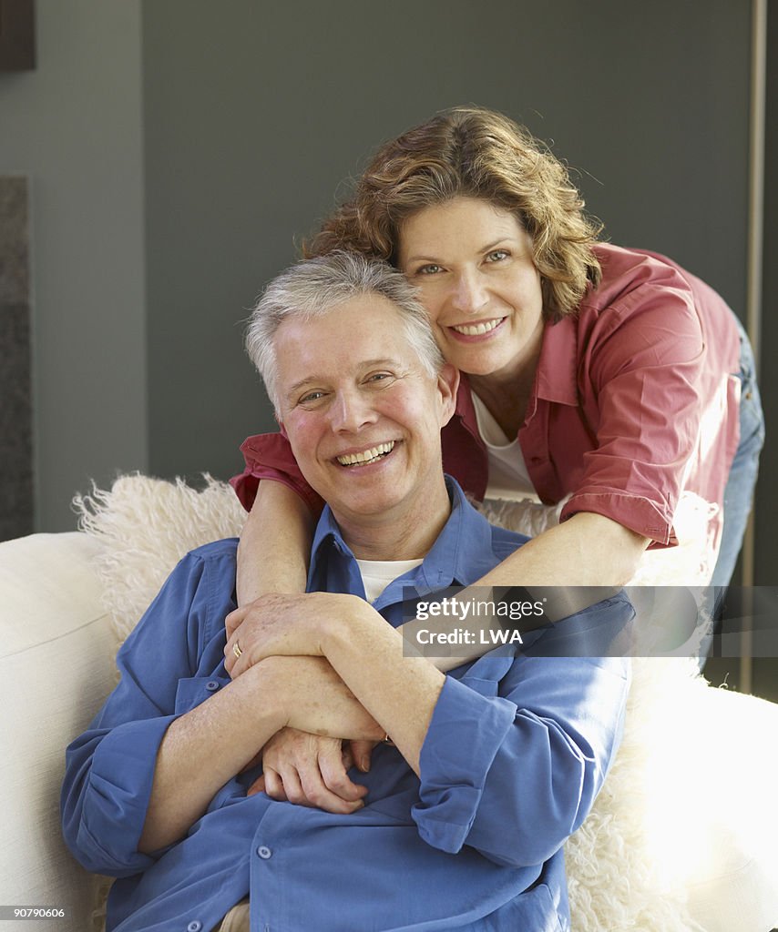 Relaxed Couple In Livingroom