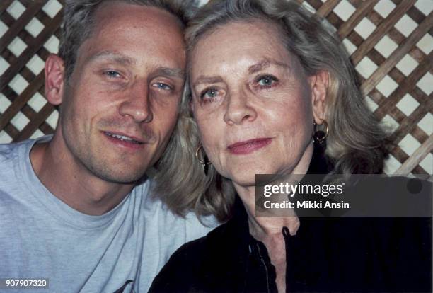 Sam Robards and mother Lauren Bacall take a tea break at Mariage Frere Maison du The during filming of 'Pret-a-Porter' in Paris, France in 1994.