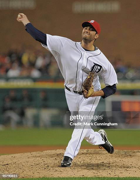 Armando Galarraga of the Detroit Tigers pitches against the Toronto Blue Jays while wearing a special red hat to commemorate 9/11 during the game at...