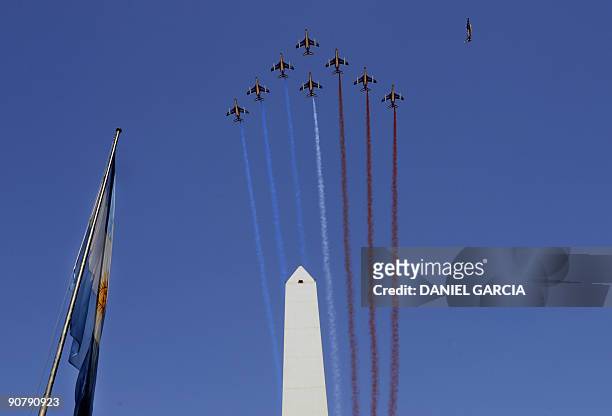 Eight French Air Force Alphajet aircrafts fly in arrow formation over the Obelisc in Buenos Aires as part of the the French contribution to the...