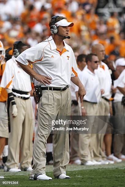Lane Kiffin, head coach of the Tennessee Volunteers looks on against the UCLA Bruins on September 12, 2009 at Neyland Stadium in Knoxville,...