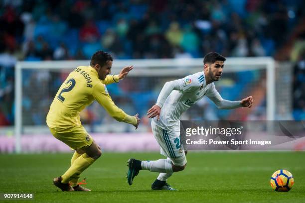 Marco Asensio Willemsen of Real Madrid fights for the ball with Mario Gaspar Perez Martínez of Villarreal CF during the La Liga 2017-18 match between...