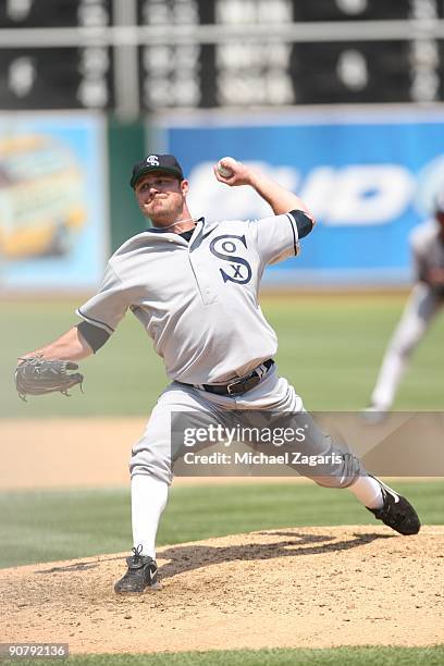 John Danks of the Chicago White Sox pitching during the game against the Oakland Athletics during the 1929-themed turn back the clock game at the...