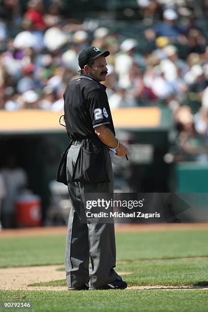 Home plate umpire Bill Hohn during the game against the Chicago White Sox during the 1929-themed turn back the clock game at the Oakland Coliseum in...