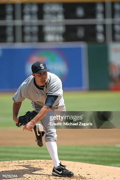John Danks of the Chicago White Sox pitching during the game against the Oakland Athletics during the 1929-themed turn back the clock game at the...