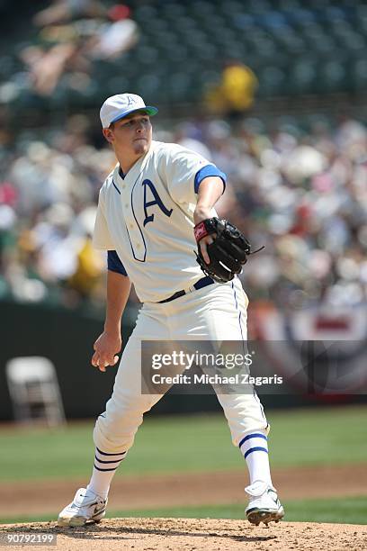 Trevor Cahill of the Oakland Athletics pitching during the game against the Chicago White Sox during the 1929-themed turn back the clock game at the...