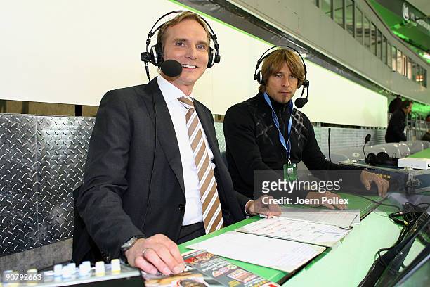 Sky commentator Kai Dittmann and head coach Michael Oenning of 1. FC Nuernberg are pictured prior to the UEFA Champions League Group B match between...