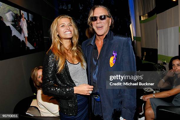 Model Cheyenne Tozzi and Mickey Rourke attend Fashion Week Spring 2010 presented by Mercedes-Benz at Bryant Park on September 15, 2009 in New York...