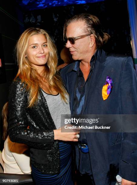 Model Cheyenne Tozzi and Mickey Rourke attend Fashion Week Spring 2010 presented by Mercedes-Benz at Bryant Park on September 15, 2009 in New York...