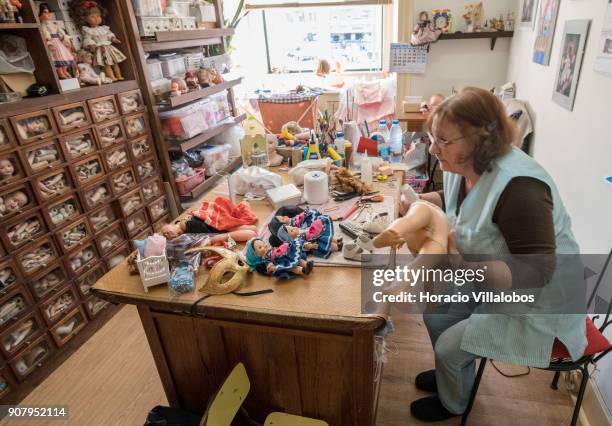 Ermelinda Francisco at work on one of the dolls at "Hospital de Bonecas" on January 18, 2018 in Lisbon, Portugal. Started in 1830 by Dona Carlota, an...