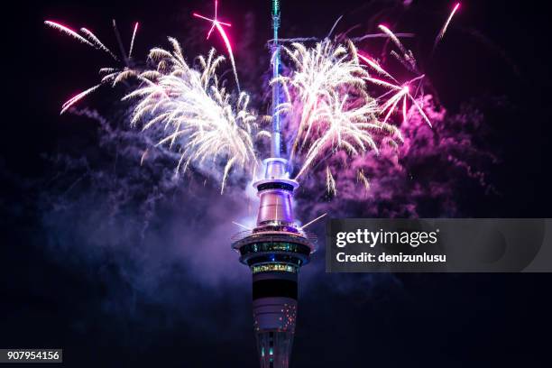 auckland skytower fireworks - auckland city stock pictures, royalty-free photos & images