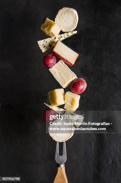 cheese in balance - queso español fotografías e imágenes de stock
