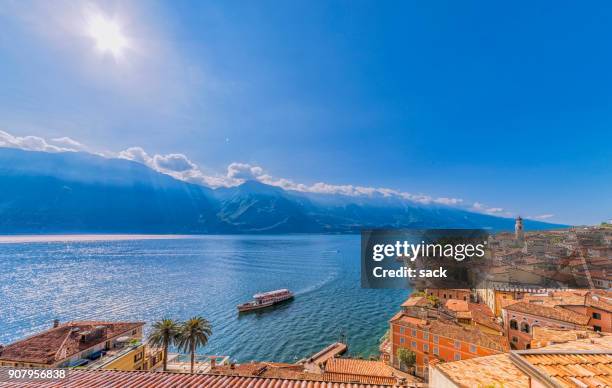 view over the lake garda and limone sul garda - malcesine stock pictures, royalty-free photos & images