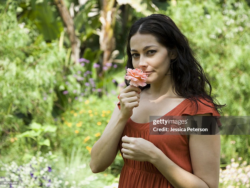 Woman holding a flower