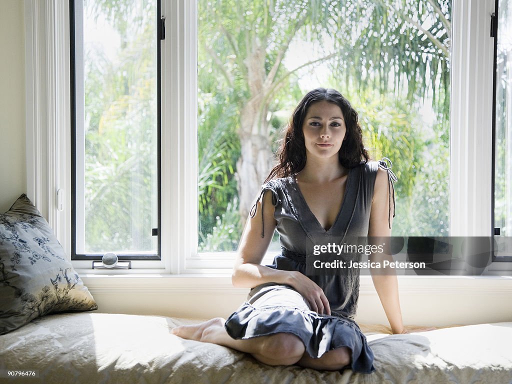 Woman on a window bench