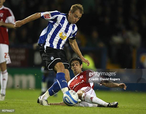 Luke Varney of Sheffield Wednesday is tackled by Rhys Williams of Middlesbrough during the Coca-Cola Championship match between Sheffield Wednesday...