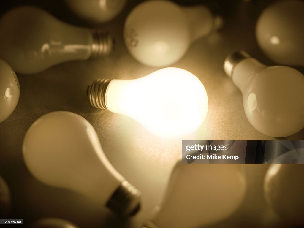 One light bulb lit up among many